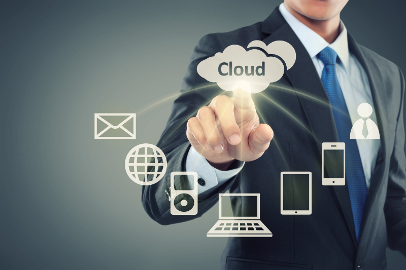 Business Man Pointing at Cloud Computing on Virtual Background