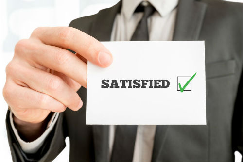 Man Holding Satisfied Sign