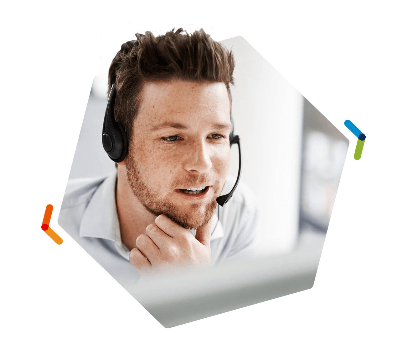 Man wearing headset on phone in a contact center
